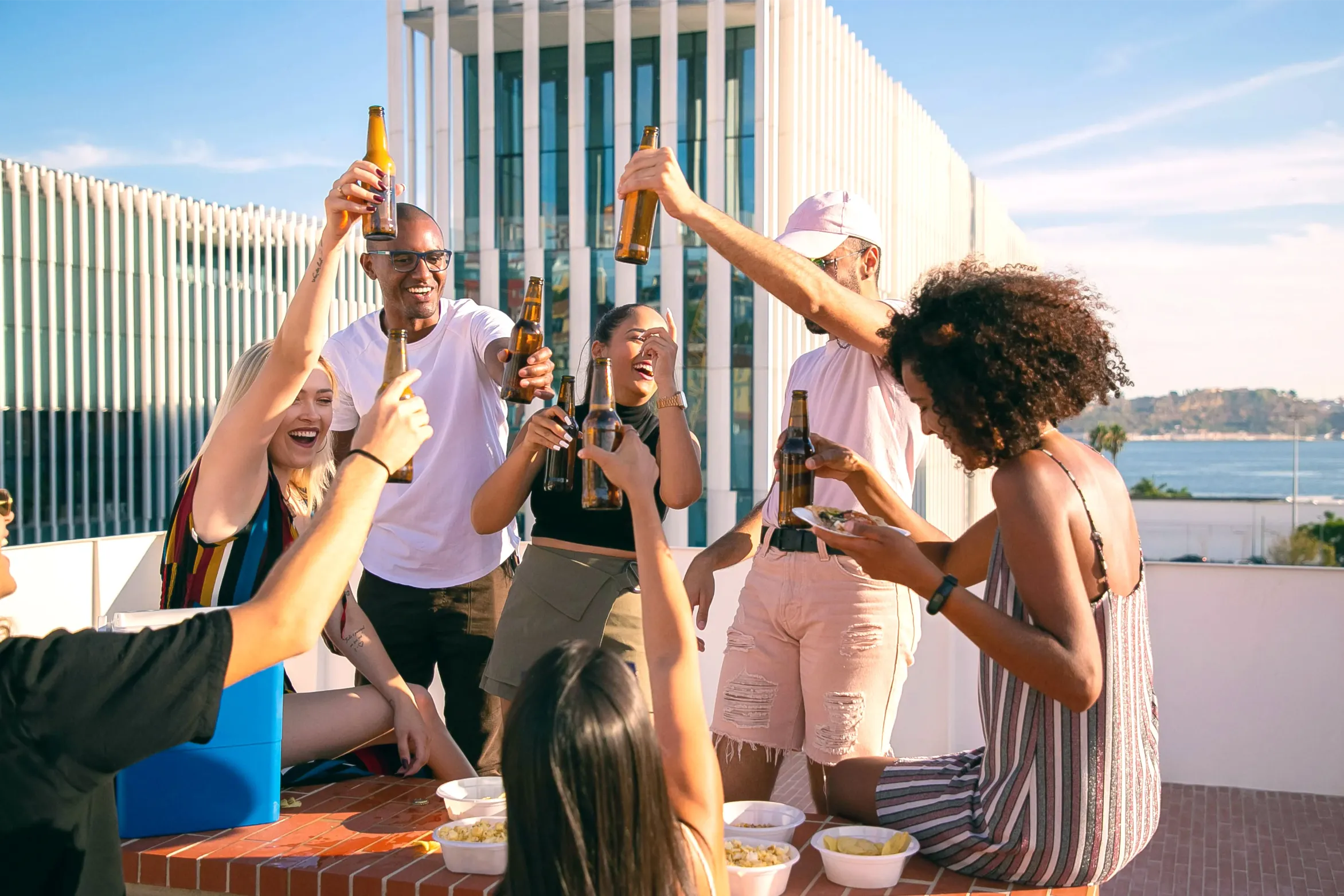 People celebrating and dining together on a terrace